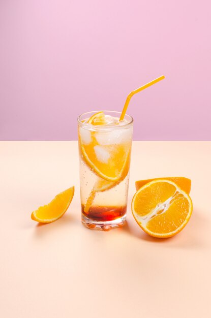 Alcohol cocktail with orange fruit slices