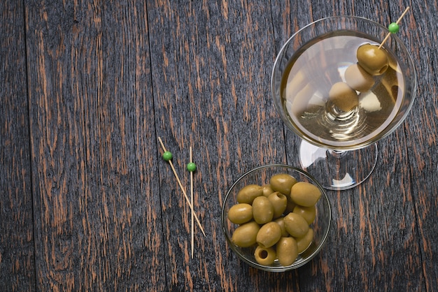 alcoholic beverage cocktail on black wooden table. Top view