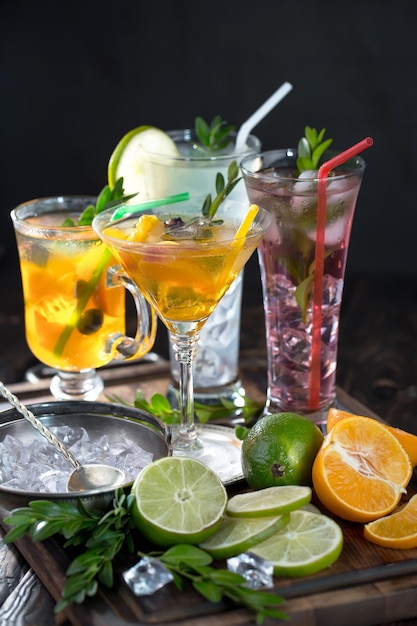 Alcoholic cocktail with fruit and ice