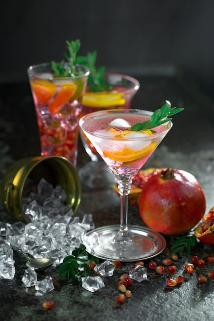 Alcoholic cocktail with fruit and ice