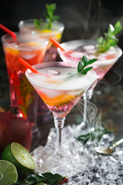 Alcoholic cocktail with fruit and ice