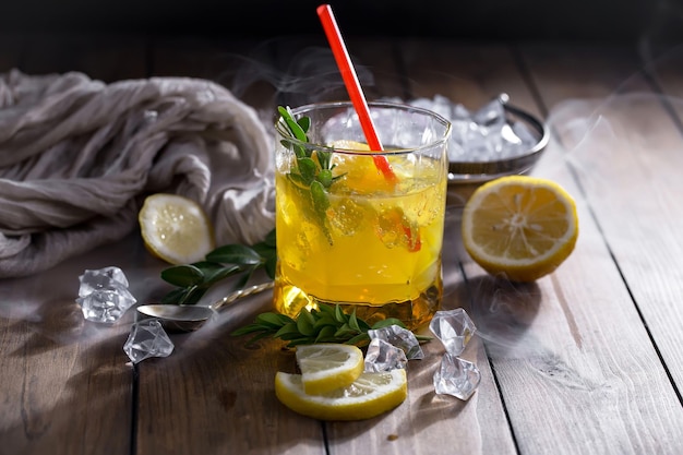 Alcoholic cocktail with fruit and ice