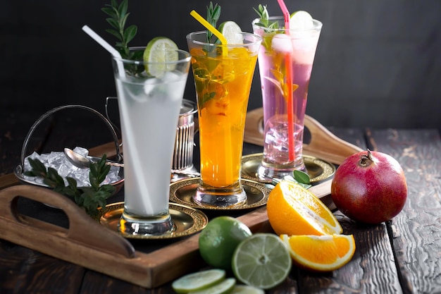 Alcoholic cocktail with fruit and ice