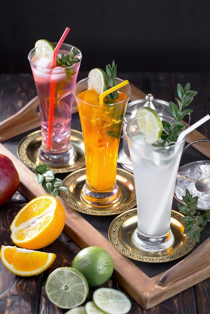 Alcoholic cocktail with fruit and ice