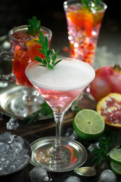 Alcoholic cocktail with fruit and ice