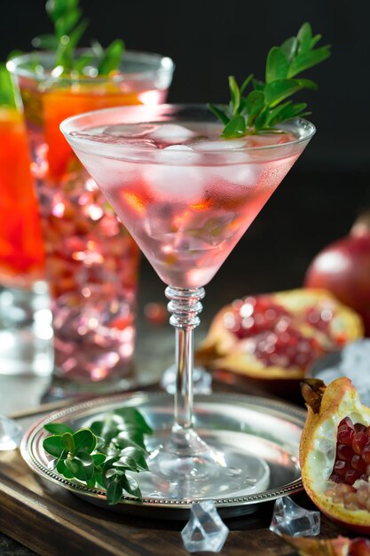 Alcoholic cocktail with fruit and ice