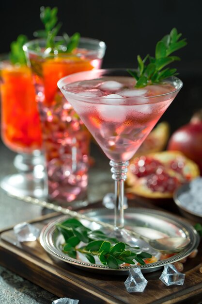 Alcoholic cocktail with fruit and ice