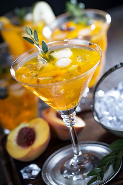 Alcoholic cocktail with fruit and ice