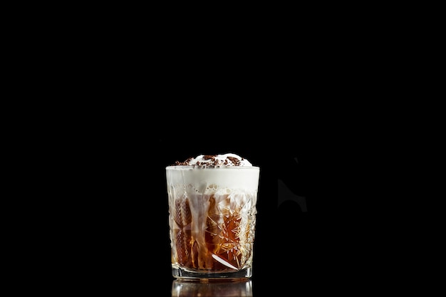 Alcoholic or nonalcoholic coffee cocktail with chocolate bitter bourbon whiskey and whipped cream