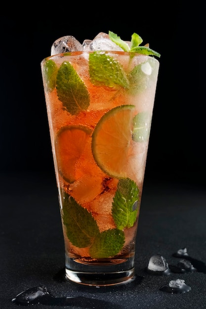 Alcoholic refreshing cocktail with mint and ice