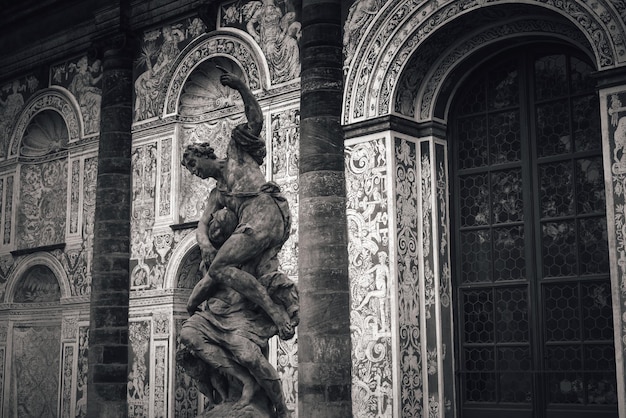 Alegory of night  baroque sculpture at in front of Real tennis room Royal Garden of Prague Castle Czech Republic