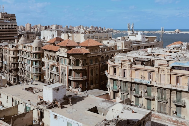 Alexandria, Egypt - 12.11.2021: Beautiful egyptian historical buildings and sea view, travel destination