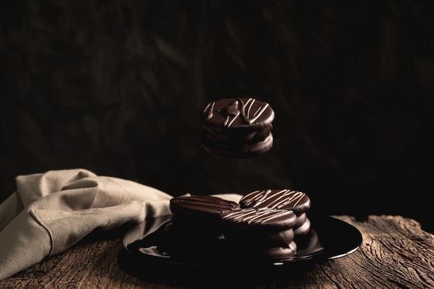 Alfajor stuffed with dulce de leche covered in chocolate argentinian latin