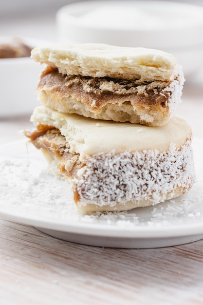 Alfajores cookies on a white plate