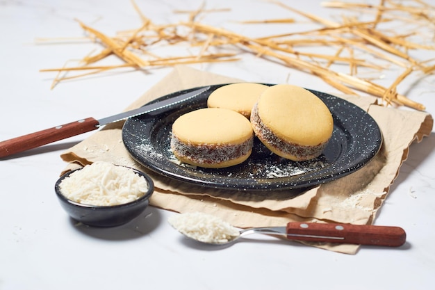 Alfajores made with cornstarch filled with caramel and coconut Traditional Argentinean pastries