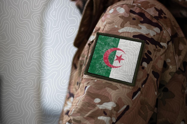 Algeria Soldier Soldier with flag Algeria Algeria flag on a military uniform Camouflage clothing