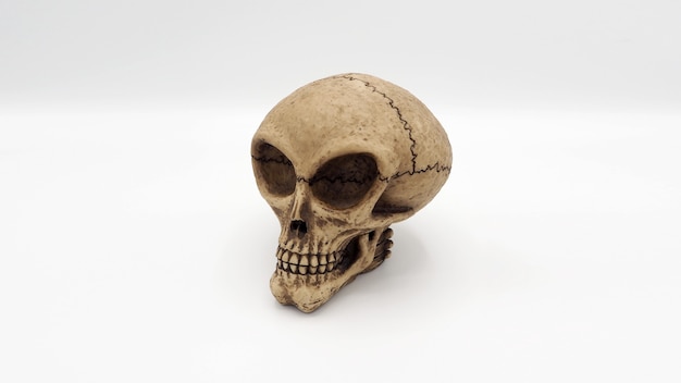 Модель игрушки черепа инопланетянина, сделанная из пластиковой смолы