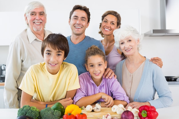 All the family smiling in kitchen