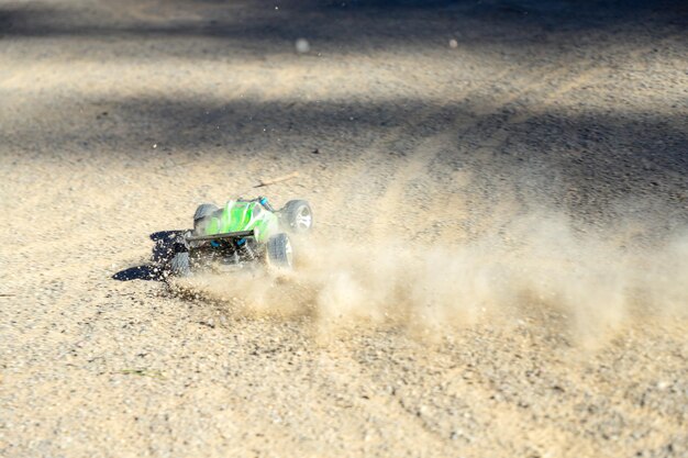 An all terrain radio controlled car on gravel