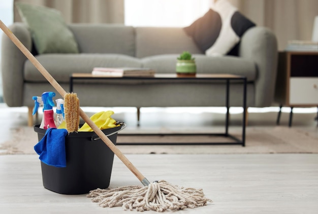 Photo all youll need for deep clean shot of a bucket of cleaning supplies