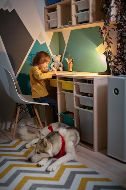 Allergy child pet dog and air purifier in childrens room