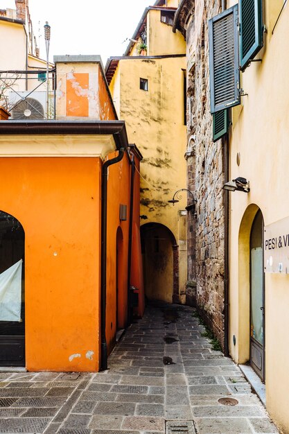 Alley amidst buildings in city