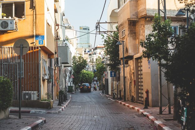 Photo alley amidst buildings in city