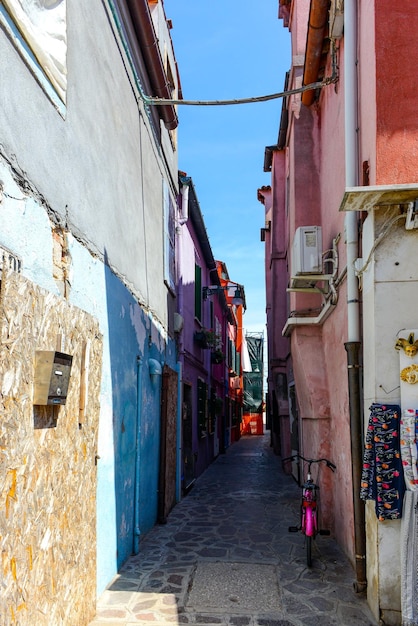 Alley in the colorful city of Burano Venice Italy