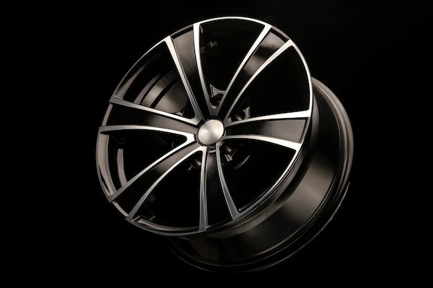 Alloy wheel black with a white groove, 6 beams for SUVs and crossovers, close-up on a black background.