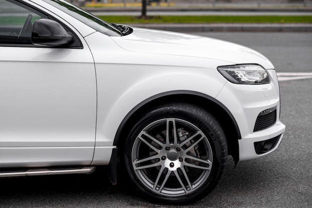 Alloy wheel and headlight of modern expensive car