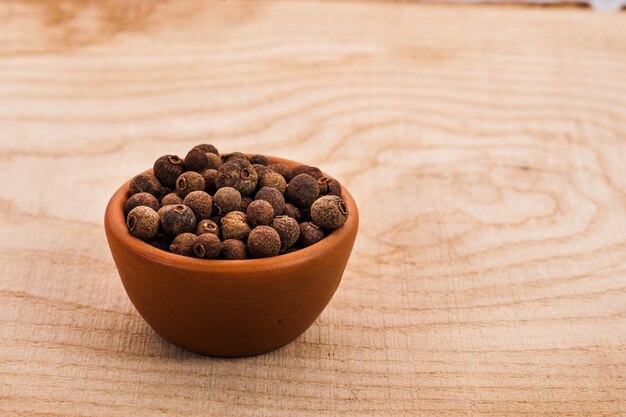 Allspice in the ceramic dish