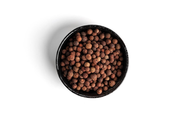 Allspice isolated on a white background Seasoning High quality photo