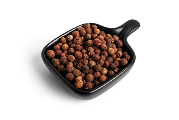 Allspice isolated on a white background Seasoning High quality photo