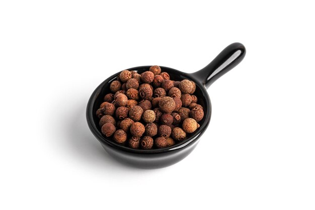 Allspice isolated on a white background Seasoning High quality photo