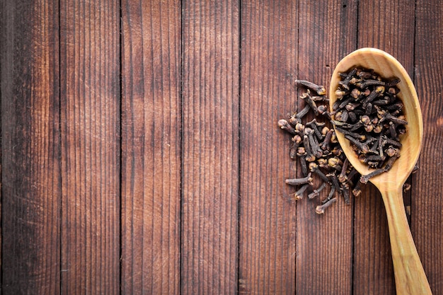 Allspice On Wooden background Top view