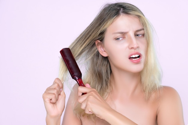 Alluring portrait of woman with cosmetic skin having hair problem