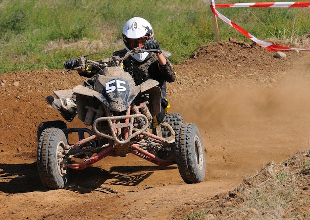 Almaty Kazakhstan 04272013 Passing the track with obstacles for fourwheeled bikes Ecofestival on the banks of the Ili River