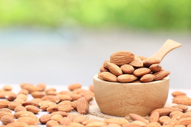 Almond in a bowl on the table blurred 