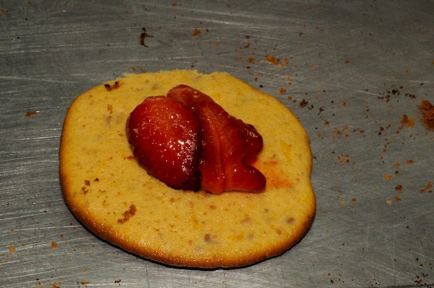 Almond cookies with a jam bath