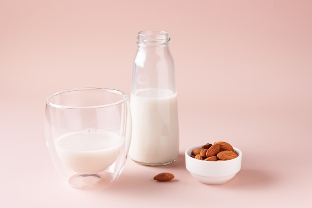 Almond milk on beige background