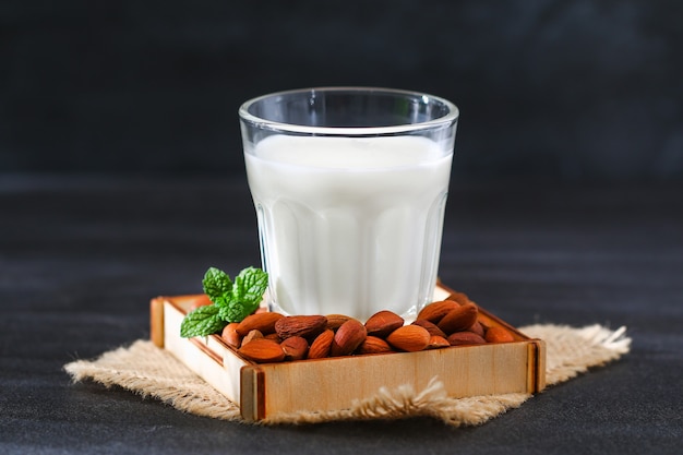 Almond milk with almond kernels alternative milk for vegetarians