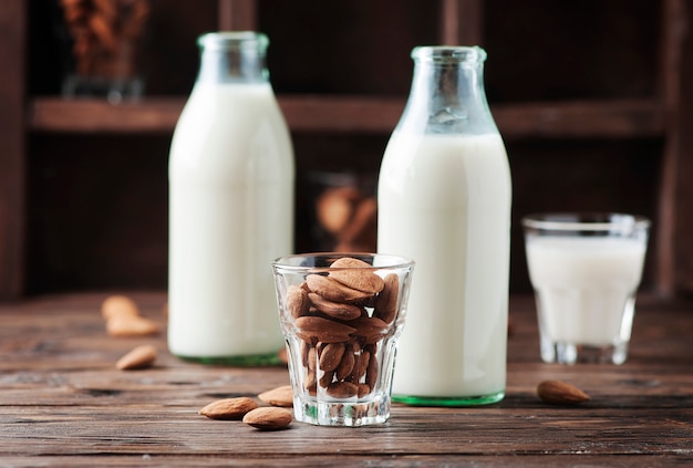 Almond milk on the wooden table