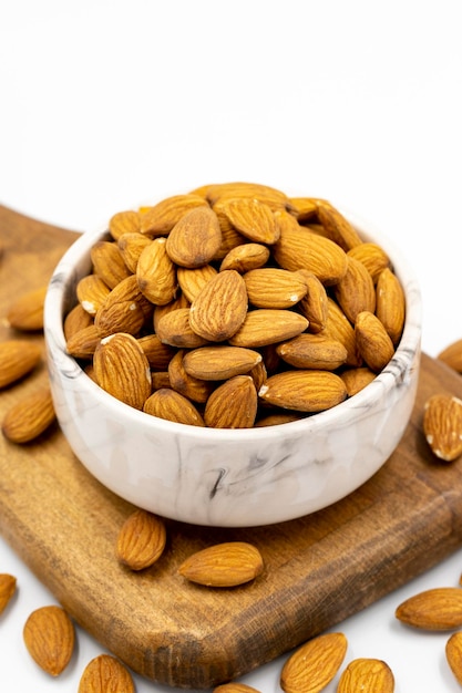 Almond nuts isolated on a white background Organic nuts close up