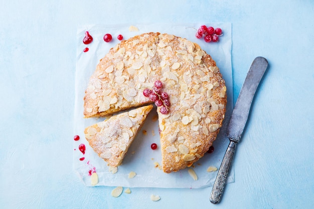 Almond and raspberry cake Bakewell tart Traditional British pastry Top view Copy space