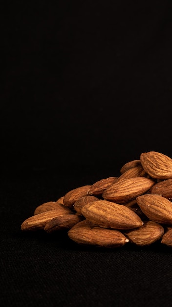 Almonds on a black background