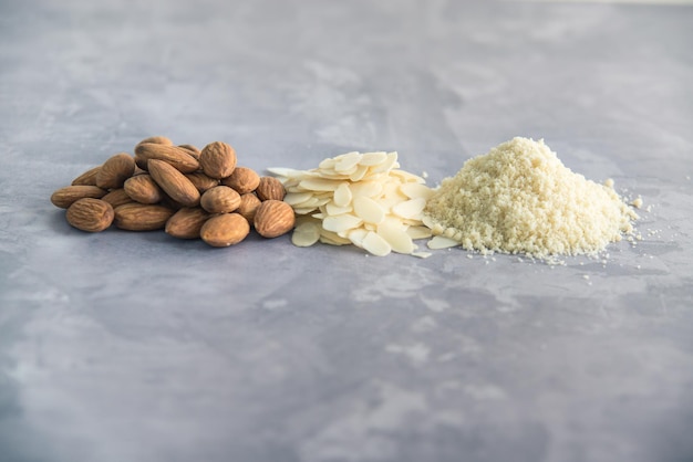 almonds flakes and flour made from it top view