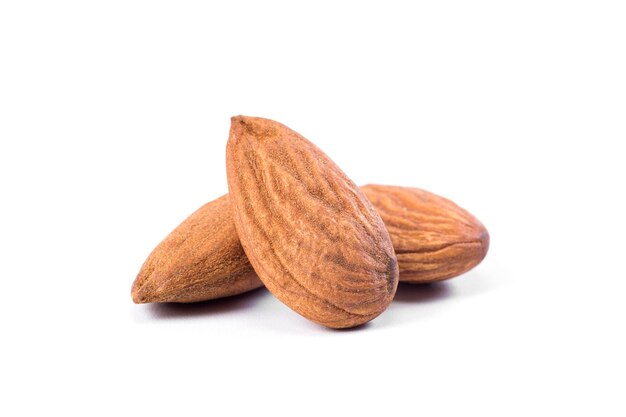 Almonds nuts on white background closeup healthy food