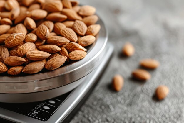 Photo almonds on a scale on a table