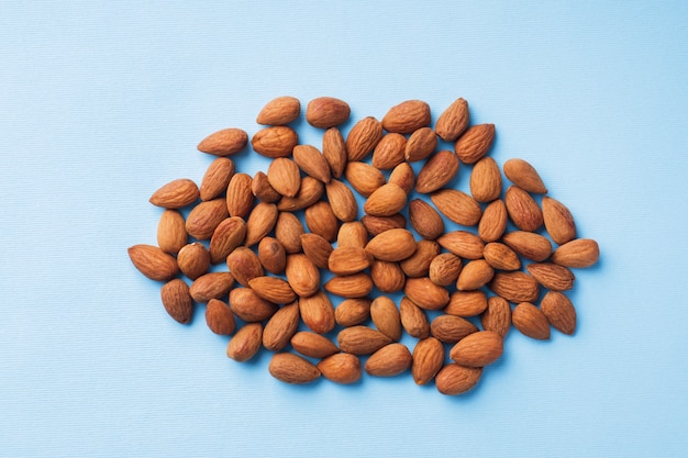 Almonds scattered on the table.