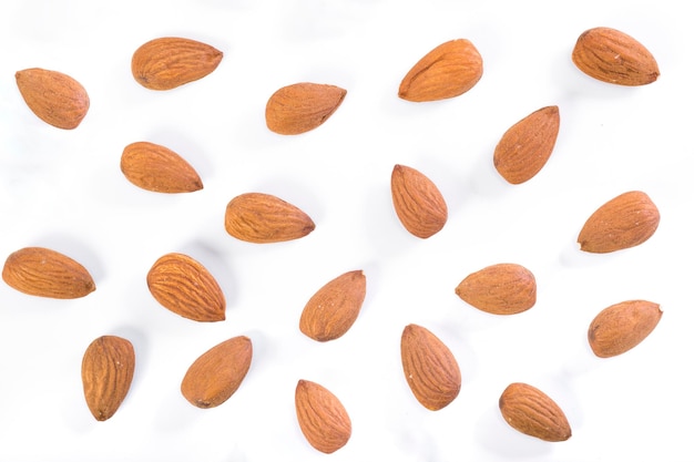 Almonds on white background Nuts healthy food